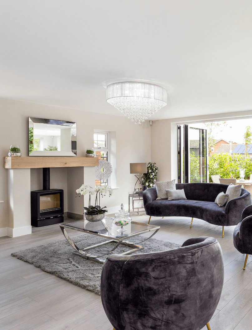 Alderbrook Road project modern seating area with a log burner that looks out onto the garden