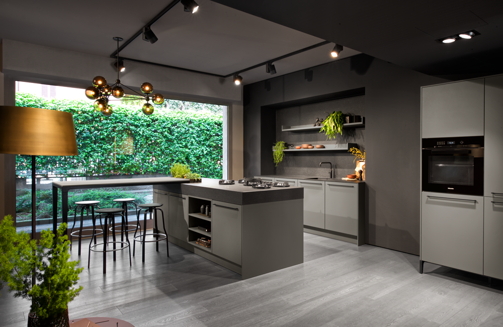 SieMatic URBAN kitchen in umbra with freestanding island, seating area, floatting shelves and herb garden